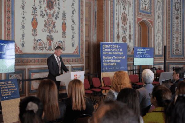 An image showing Kurt Farrugia, Superintendent of Cultural Heritage, addressing the Local Seminar for Heritage Professionals on Standards for Conservation.